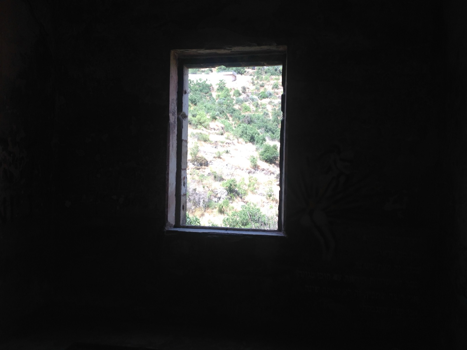 Ein Lifta. View from within a ruin, through a stone window frame, to the valley below, May 2016.